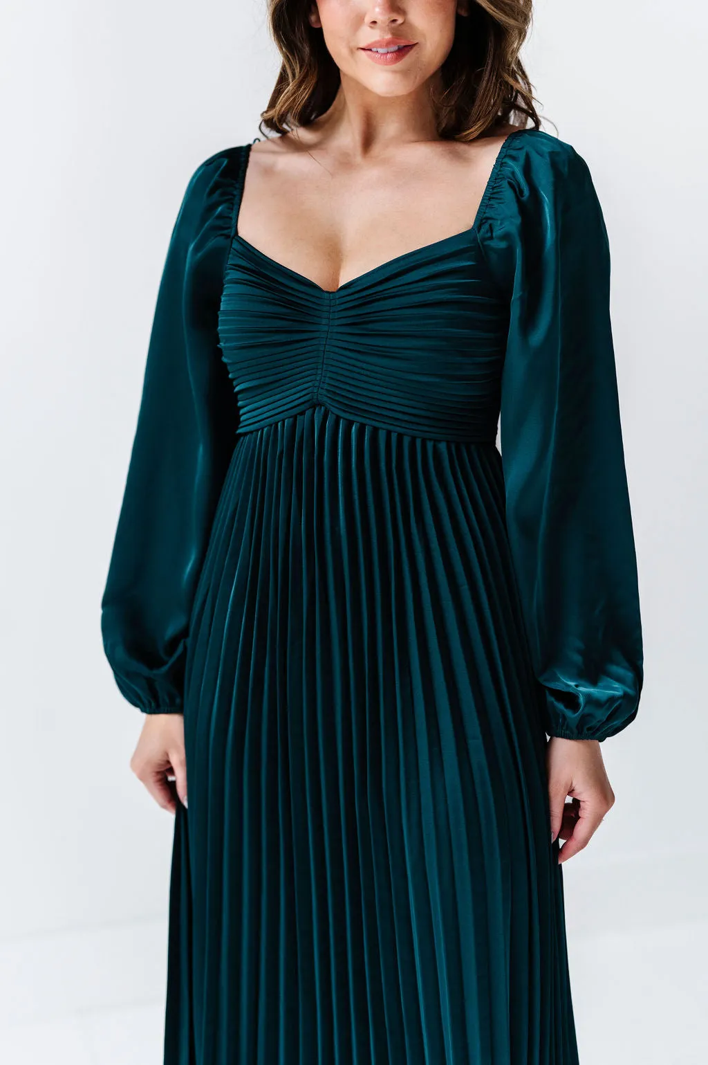 Fa La La Pleated Dress in Hunter Green